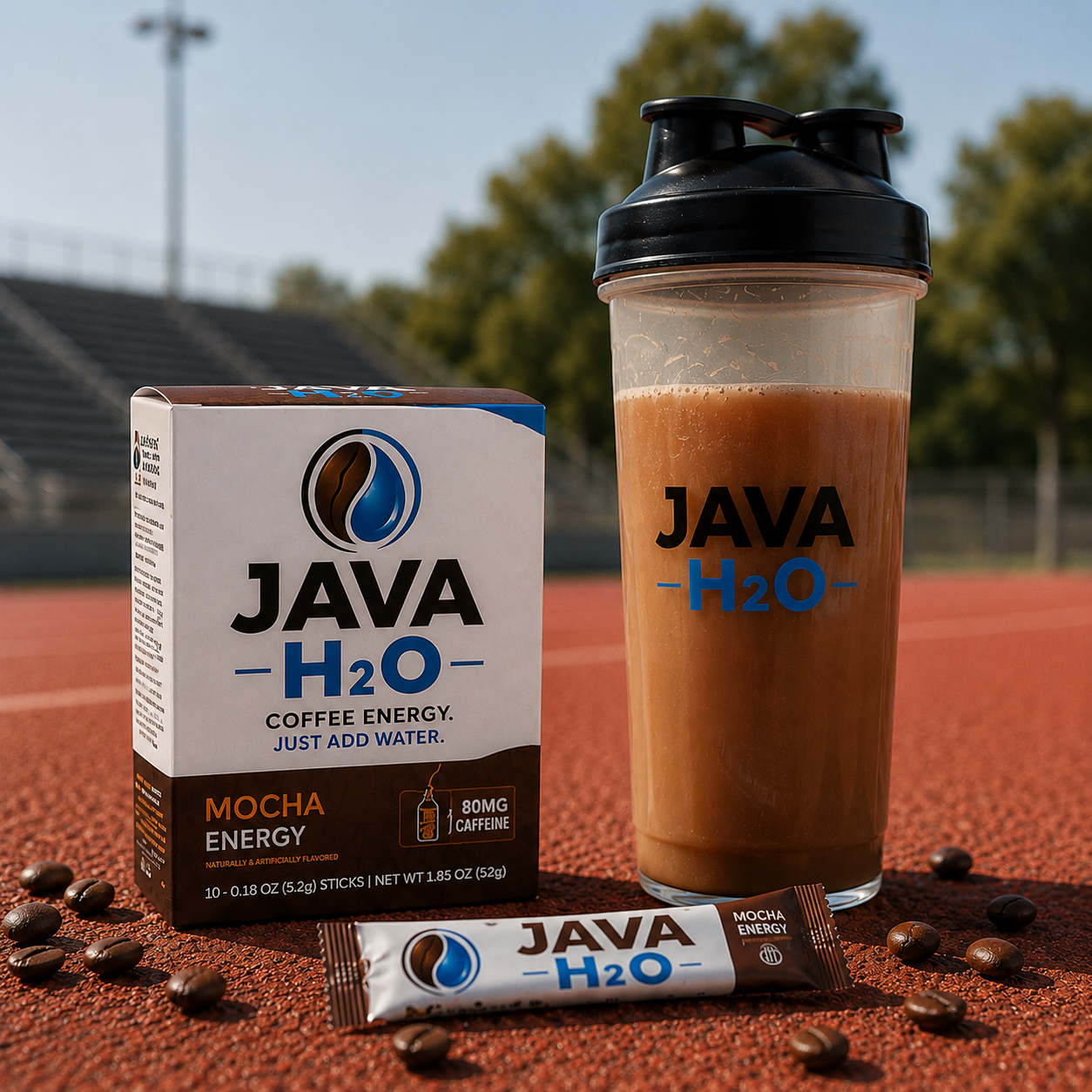 Java H2O Mocha Energy box, shaker bottle, and stick pack on a running track